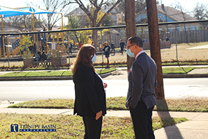 Principal Candee Martinez showing Rep. Anchia the 10th Street Playground
